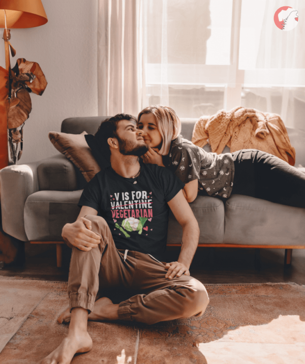 bearded-man-and-his-girlfriend-at-their-living-room-wearing-vegetarian-t-shirts