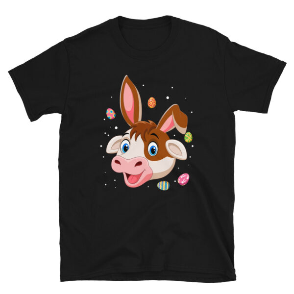a black t shirt featuring a cartoon cow with easter eggs, in the style of shiny/glossy, cartoon compositions, cute and colorful, strong facial expression, fawncore,