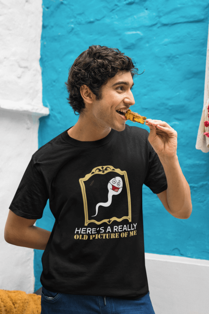 heres-a-really-old-picture-of-me-t-shirt-t-mockup-of-a-man-eating-a-street-food