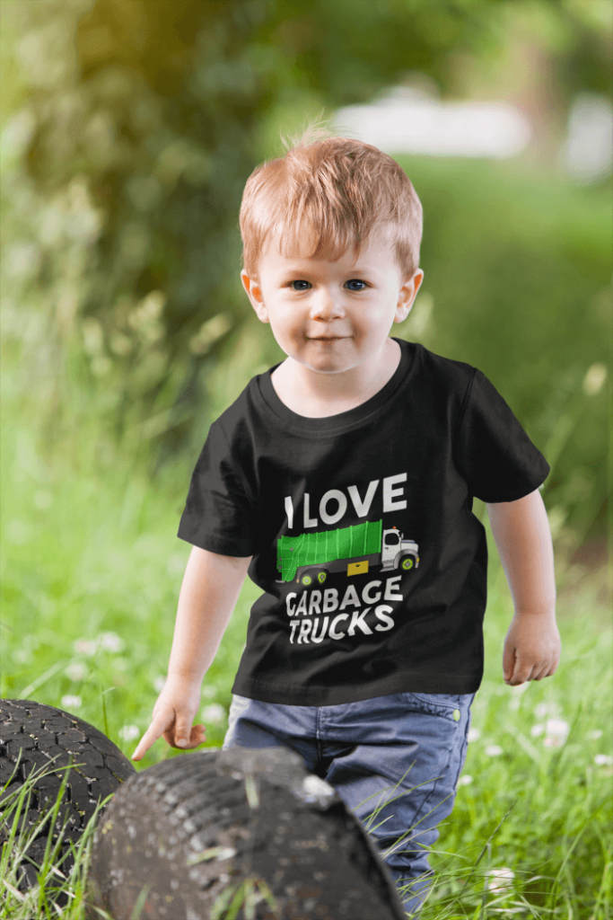 i-love-garbage-trucks-t-shirt-mockup-of-a-little-boy-playing-in-nature