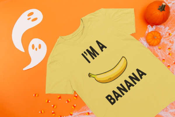im-a-banana-shirt-mockup-of-a-flat-laid-t-shirt-on-a-surface-with-halloween-items